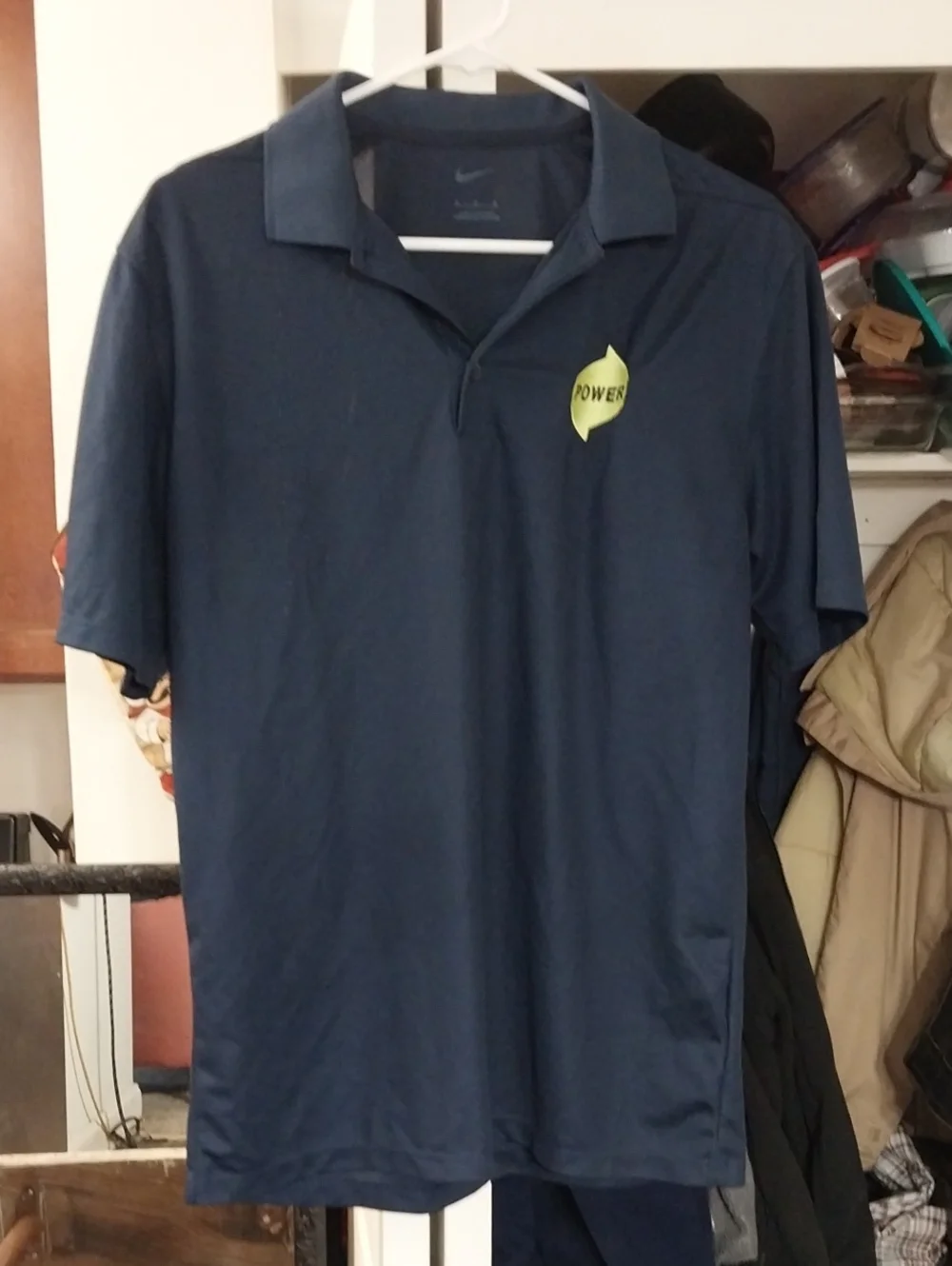 Nike Men’s Navy Polo with Yellow Chest Emblem